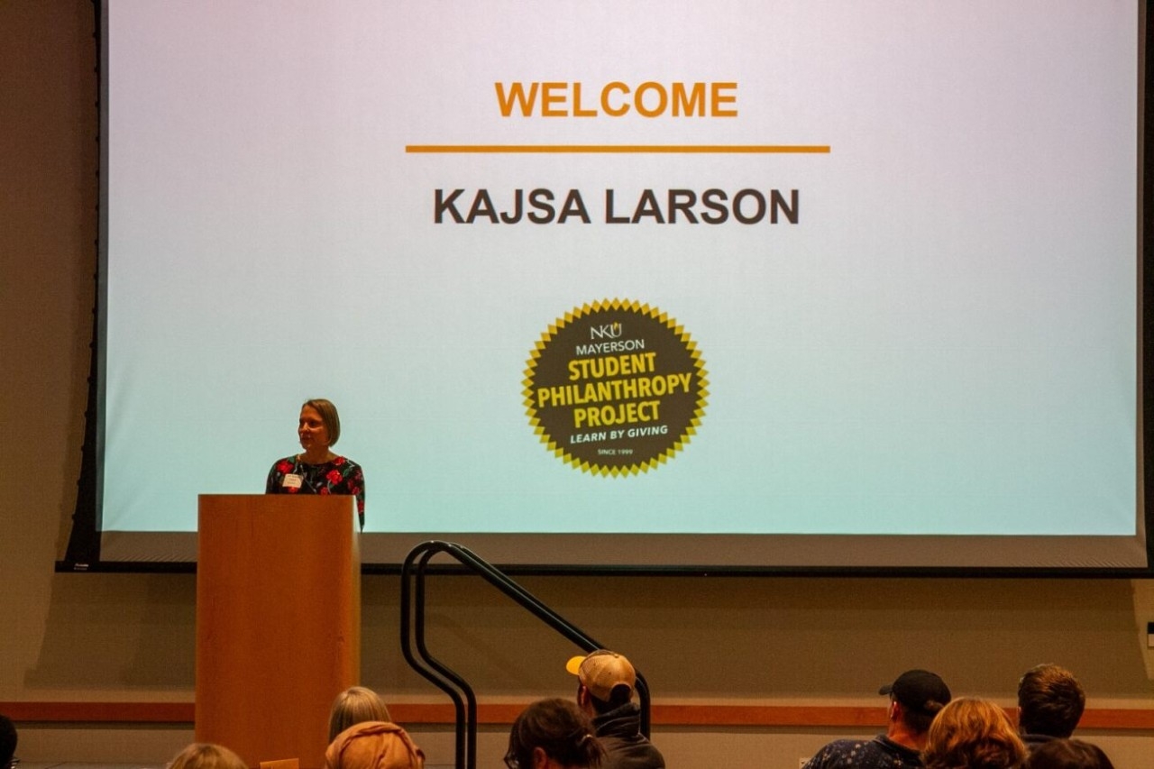 Dr. Kajsa Larson speaks to attendees.