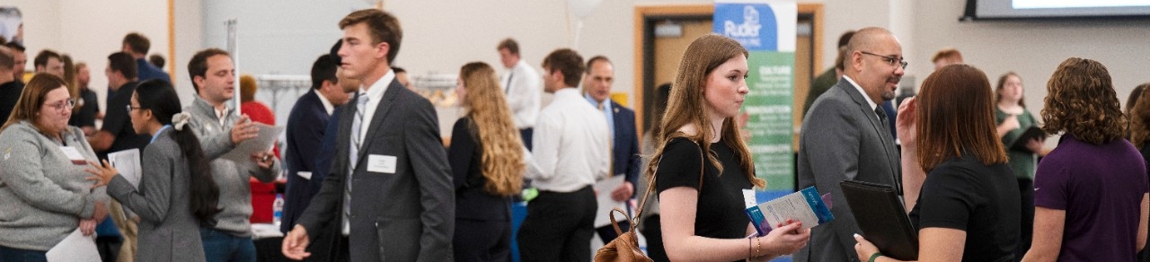 Students and employers at career fair. 
