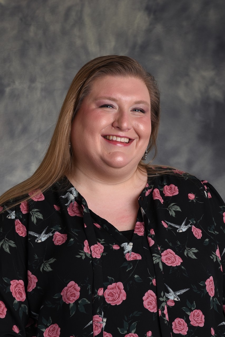 A professional headshot taken of Melanie Hartzel