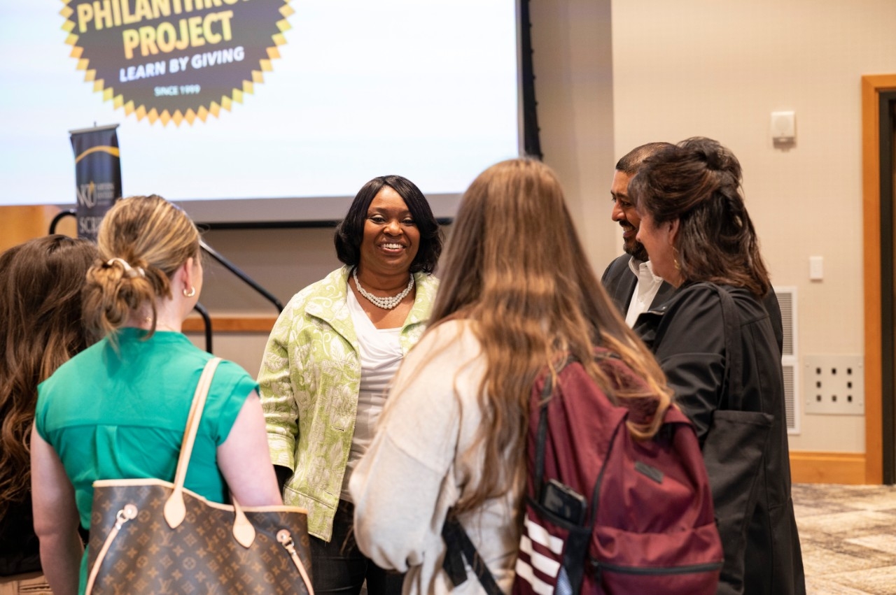 Speaker giving a presentation in Griffin Hall