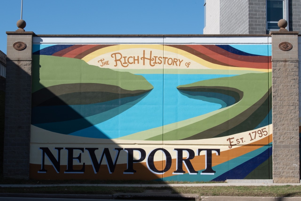 Mural of a valley that's titled "The Rich History of Newport"