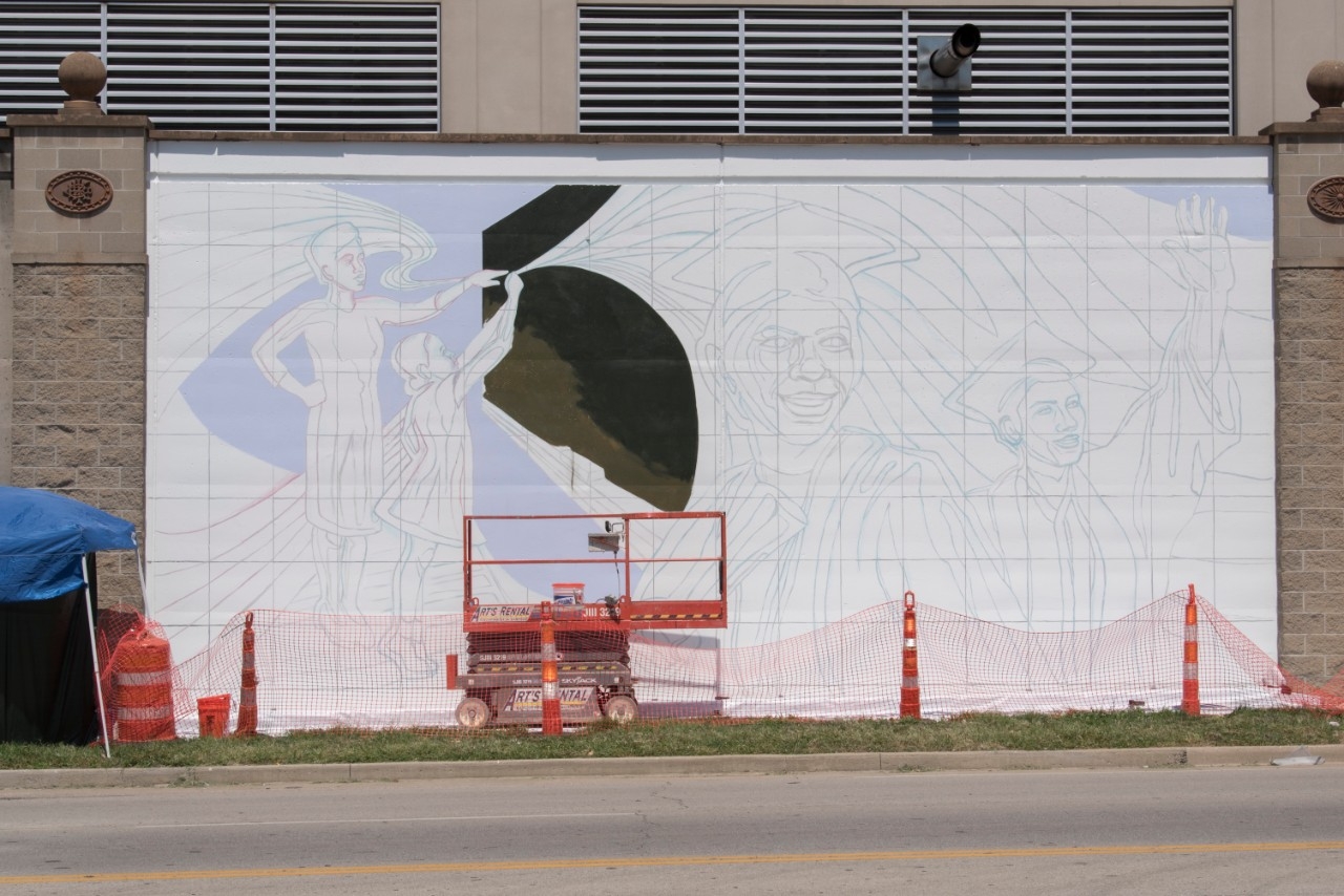 Partially painted mural.