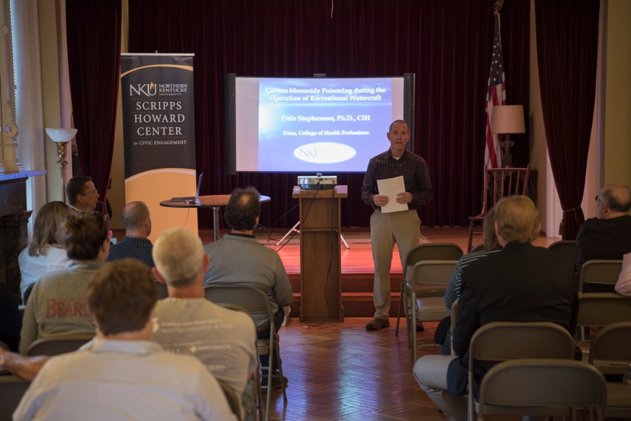 Person giving a presentation at SixAtSix