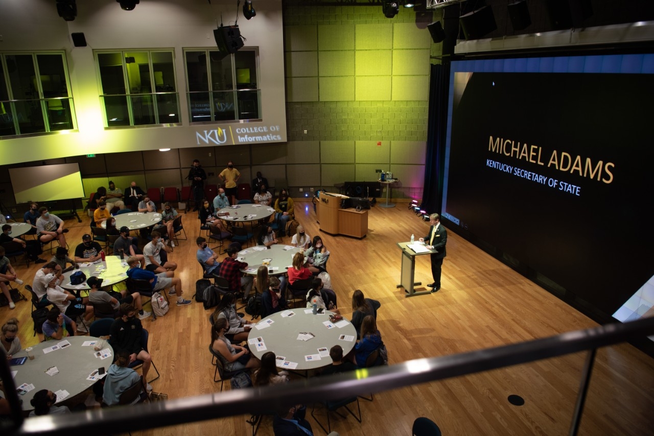 Speaker giving a presentation in Griffin Hall