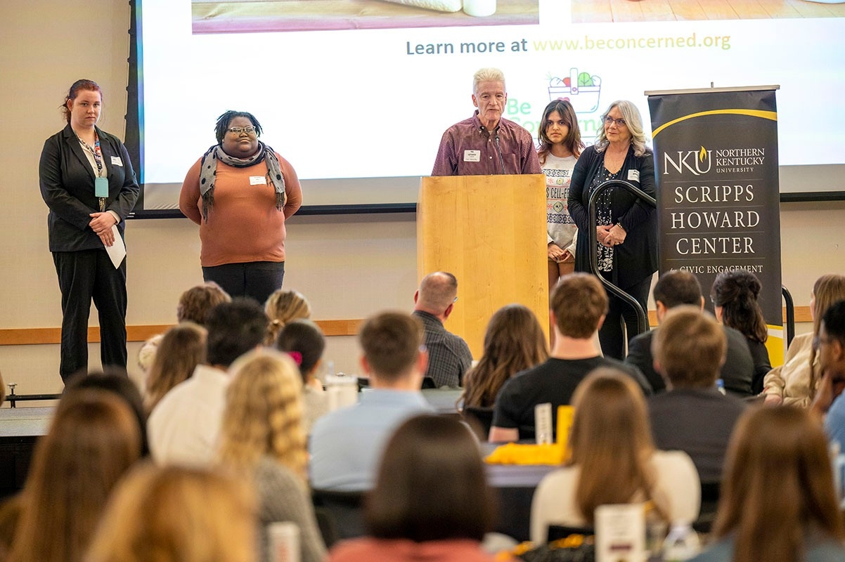 Non-profit accepts award.