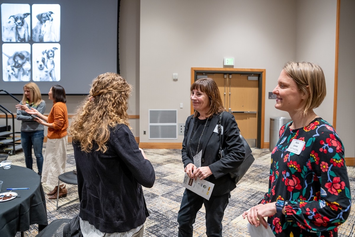 Attendees socialize after the ceremony.