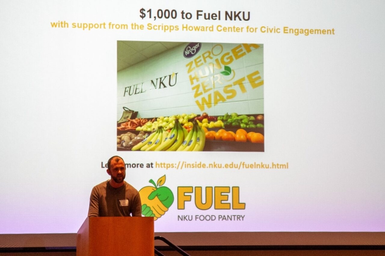Nick Bliven of Fuel NKU speaks at the podium.