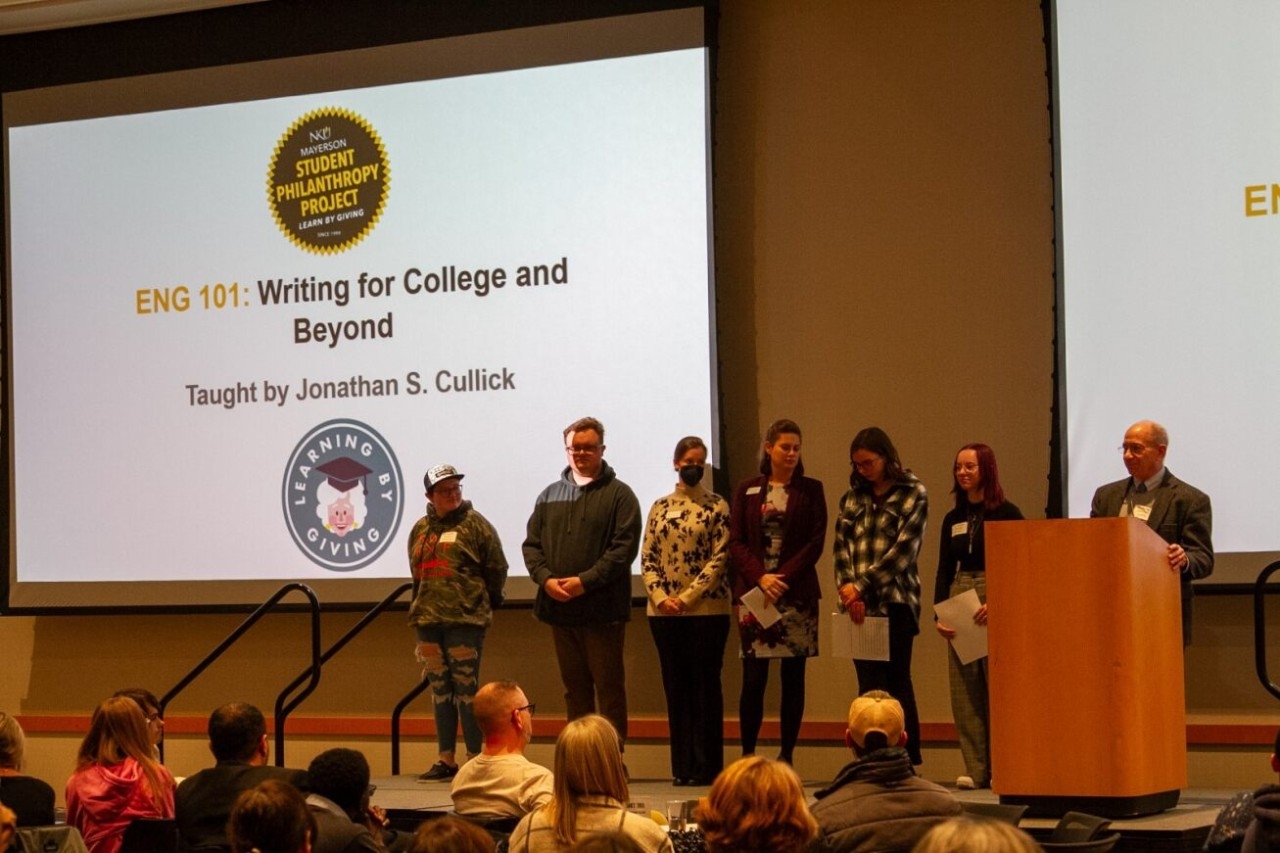 Dr. Jonathan Cullick presents with his class.