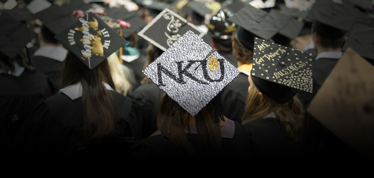 A photo of NKU Graduates' hats at commencement
