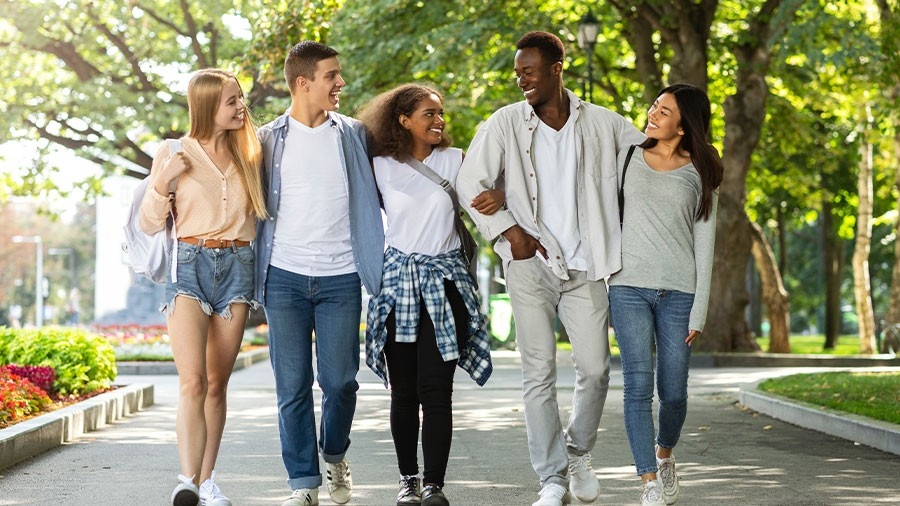 A group of students walking together on campus