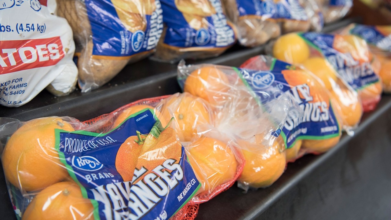 FUEL NKU workers provide bottles of water and other items to students