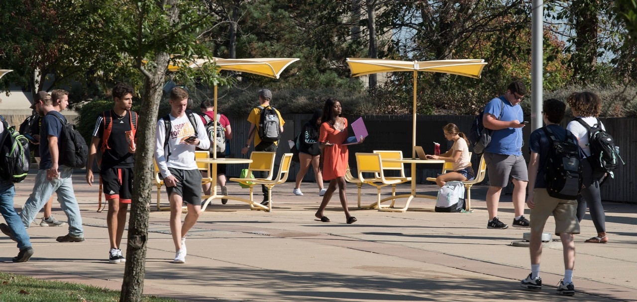 Students walking around outside during the day at NKU.