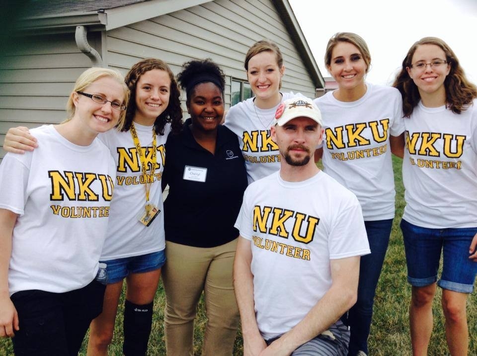 Group of students volunteering outdoors