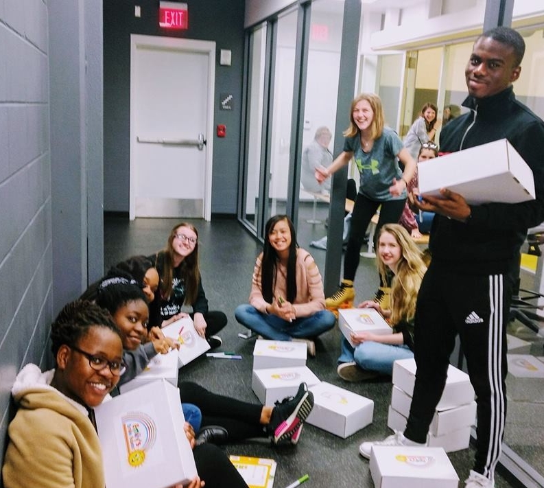 Students studying in a hallway