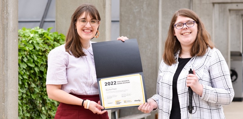 Student winning a Steely Research award
