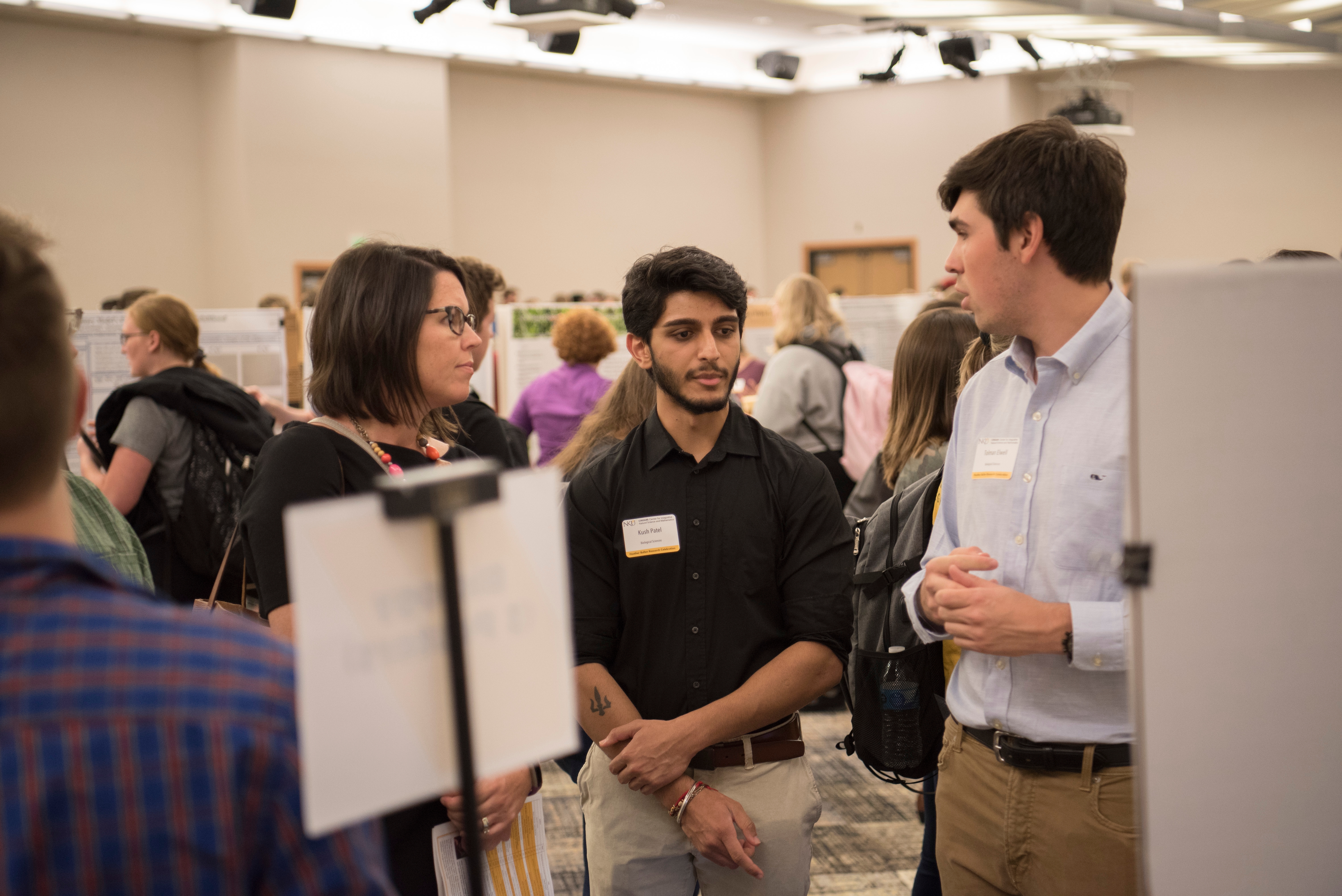 Students and Faculty at a poster session