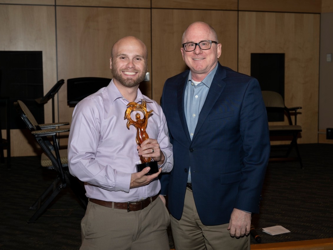 Justin Yates accepting SOL award.