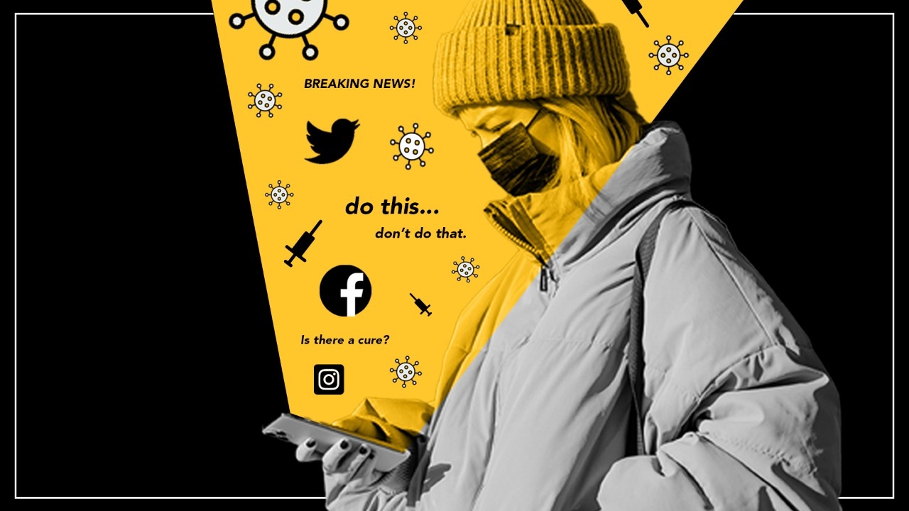 Woman with mask on looking at phone 