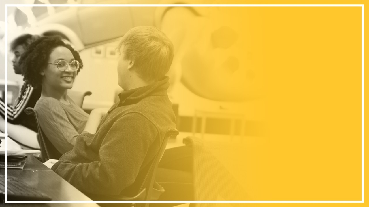 Two students sitting at Steely Library