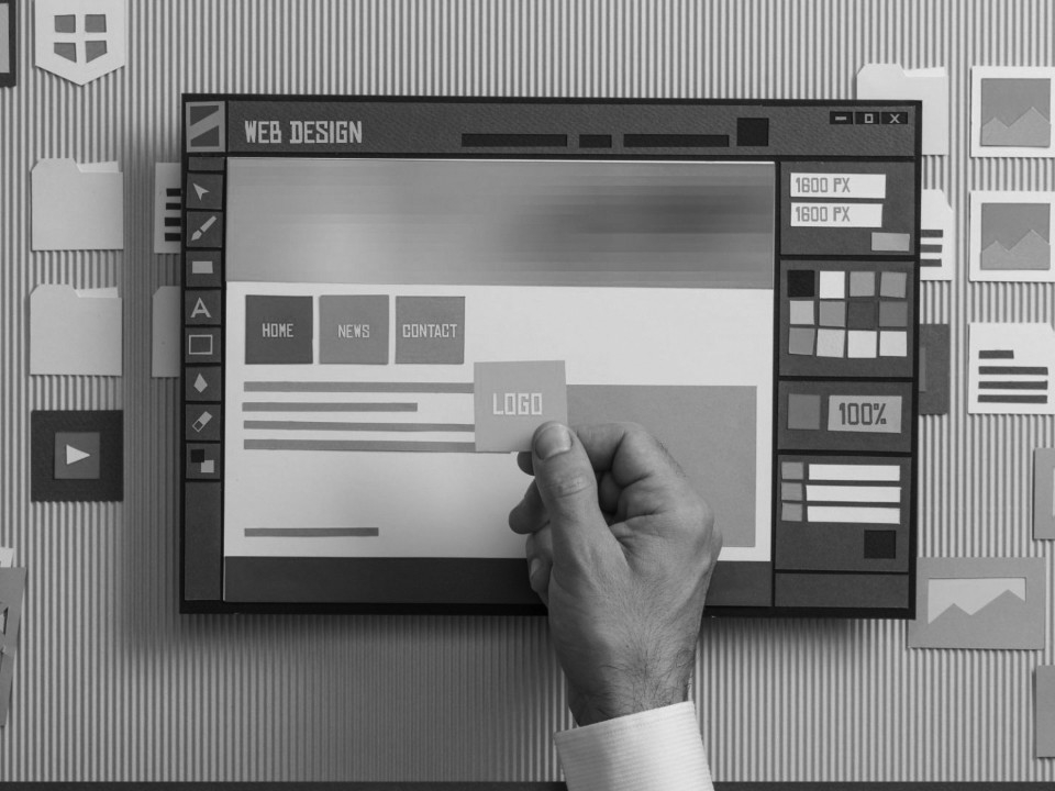 Hand placing items on a web screen