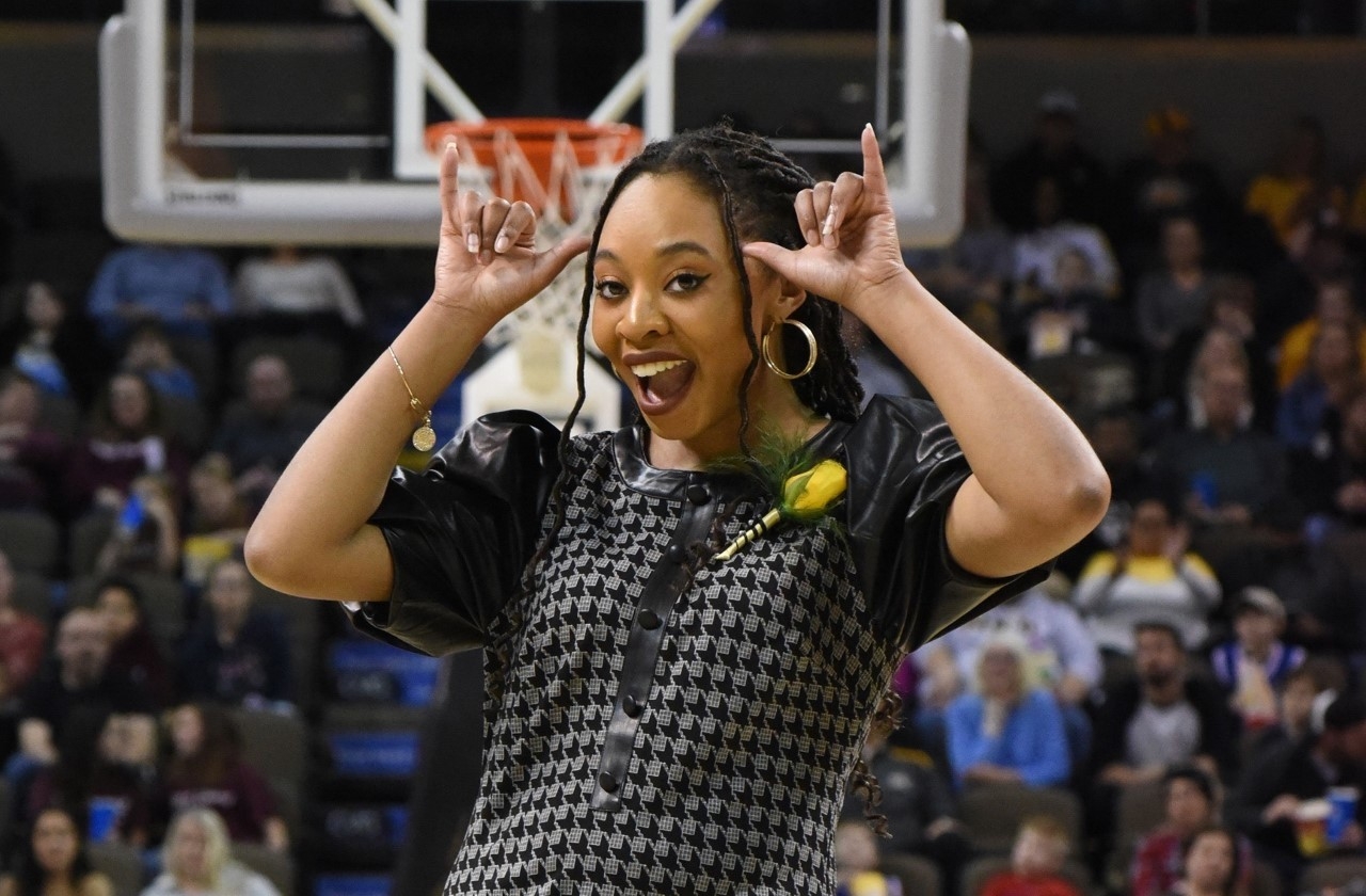 Sierra Newton norsing up at basketball game