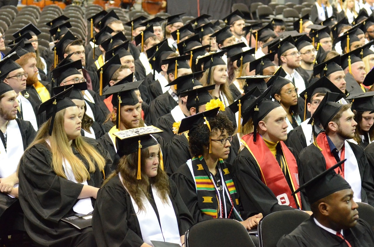 graduates at commencement