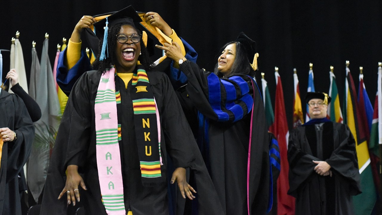 Graduate getting hooded