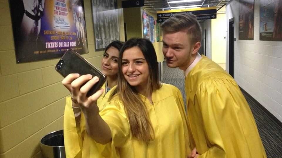 Graduates taking a selfie