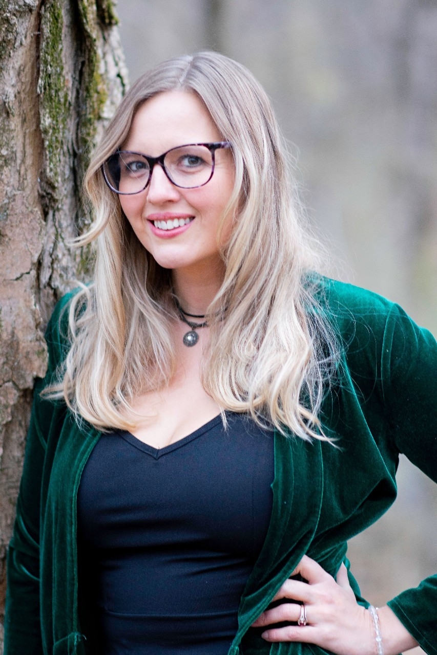 Portrait of Sara Moore Wagner in front of tree