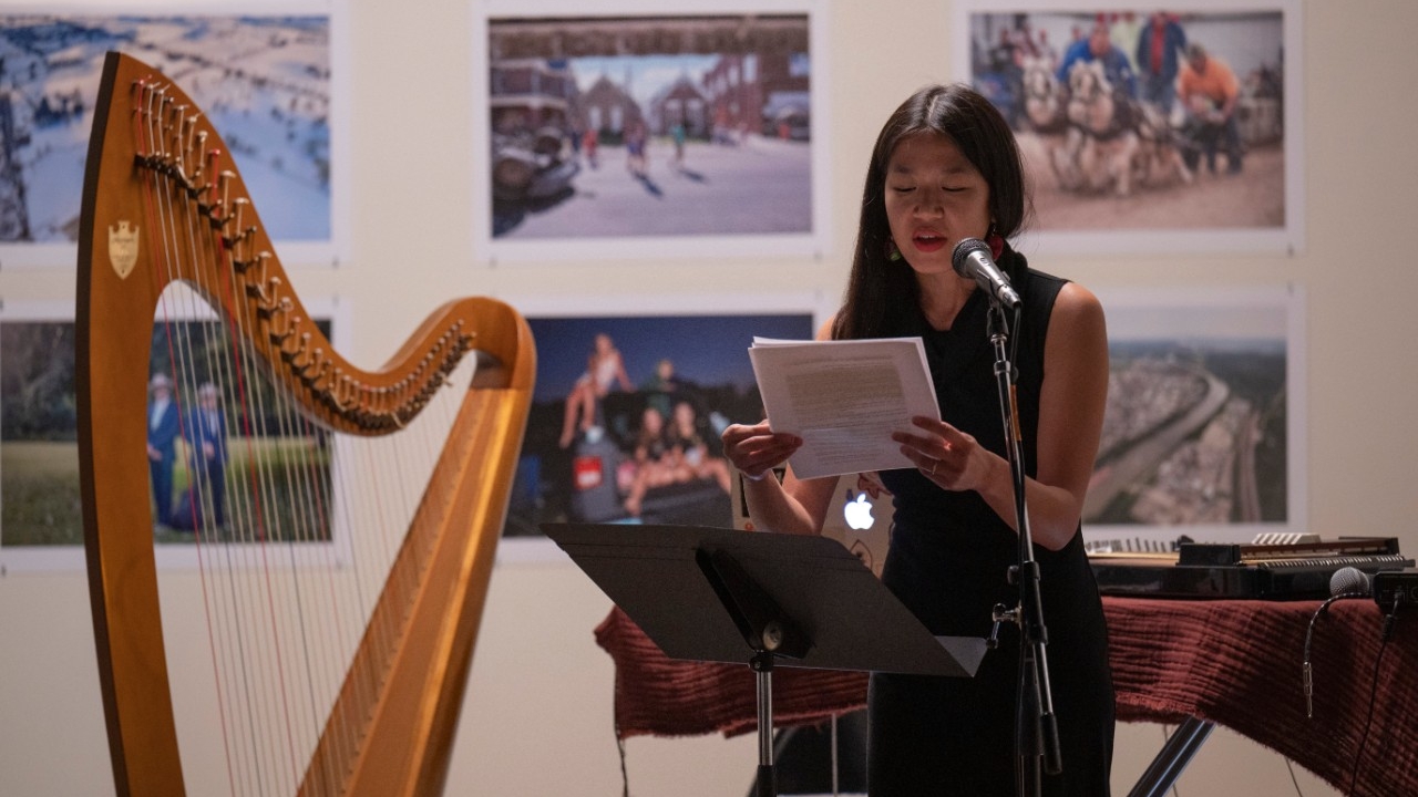 Marianne Chen reads onstage at the Loch Norse open mic night