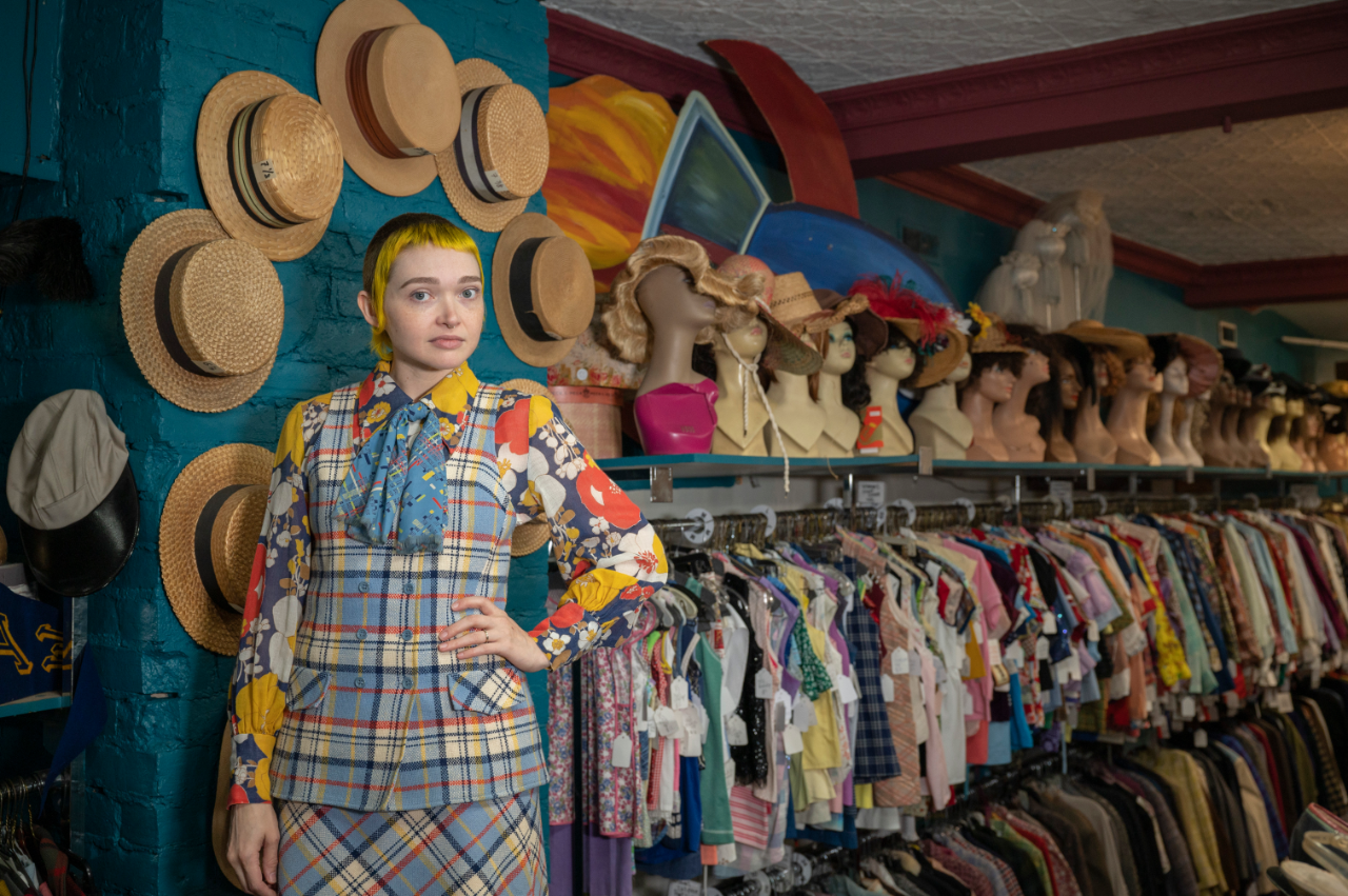 Ashley Beauefille Cook standing in front of a store display