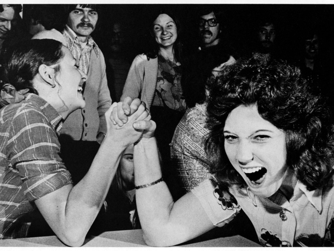 Two contestants armwrestling