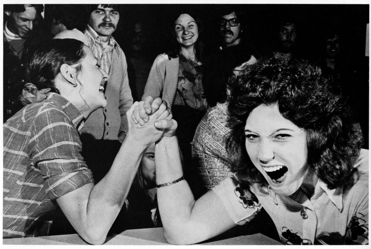 Two contestants armwrestling