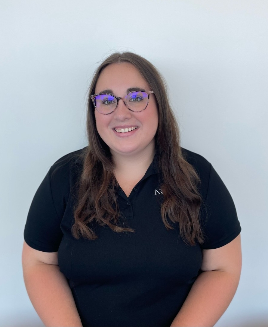 Portrait of Madison Smith in front of white backdrop