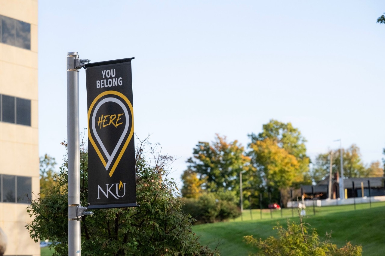 Banner displayed on NKU's campus reading "You Belong Here"