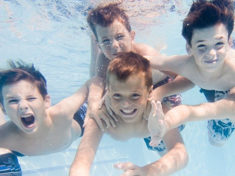 Kids swimming in pool