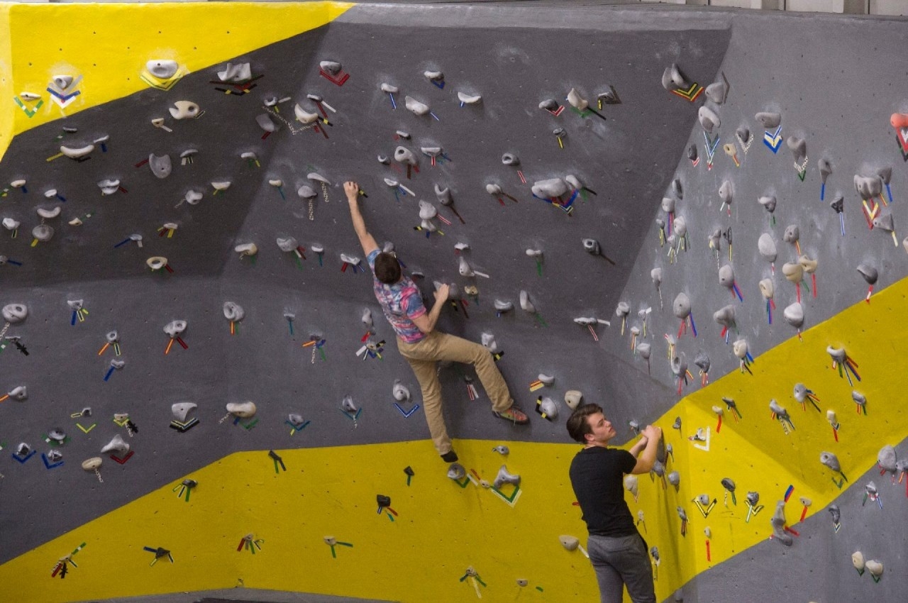Students Climbing on Bouldering Wall