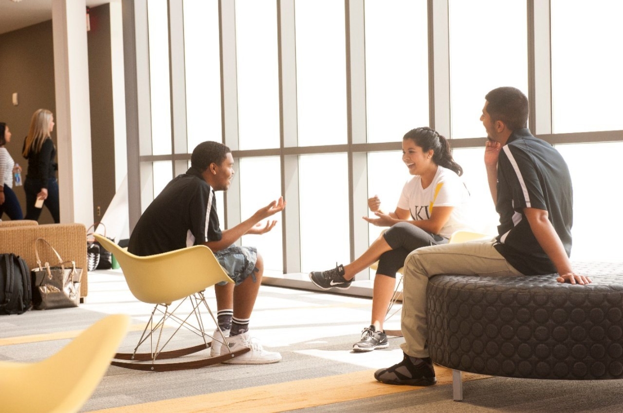 Students sitting and chatting together