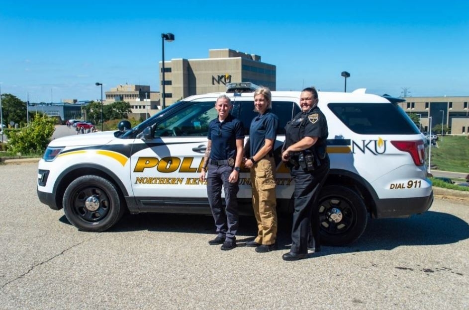 NKU Police Officers in front of police car