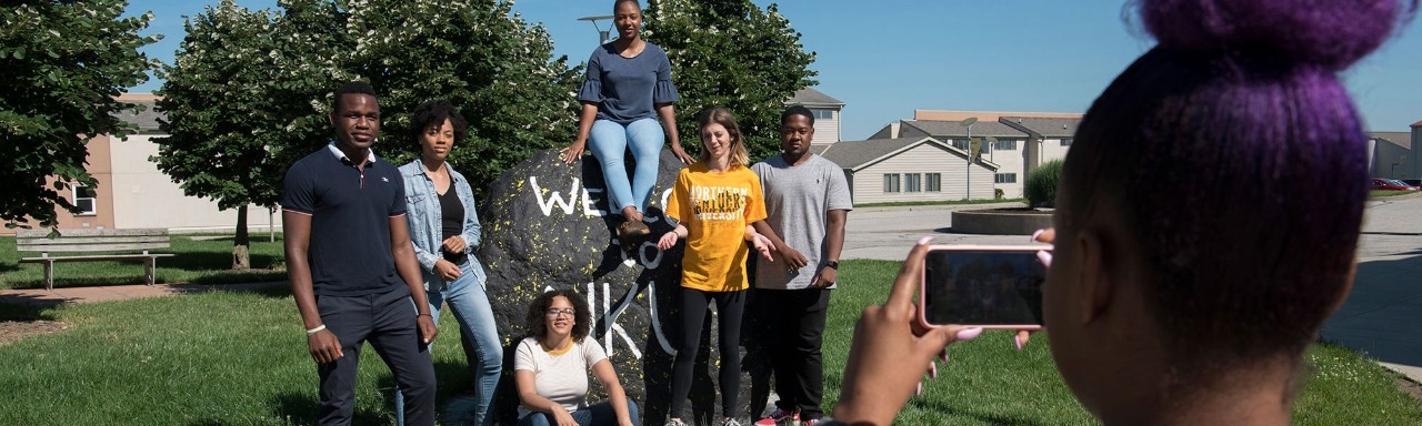 NKU Students taking a picture outside of Norse Commons