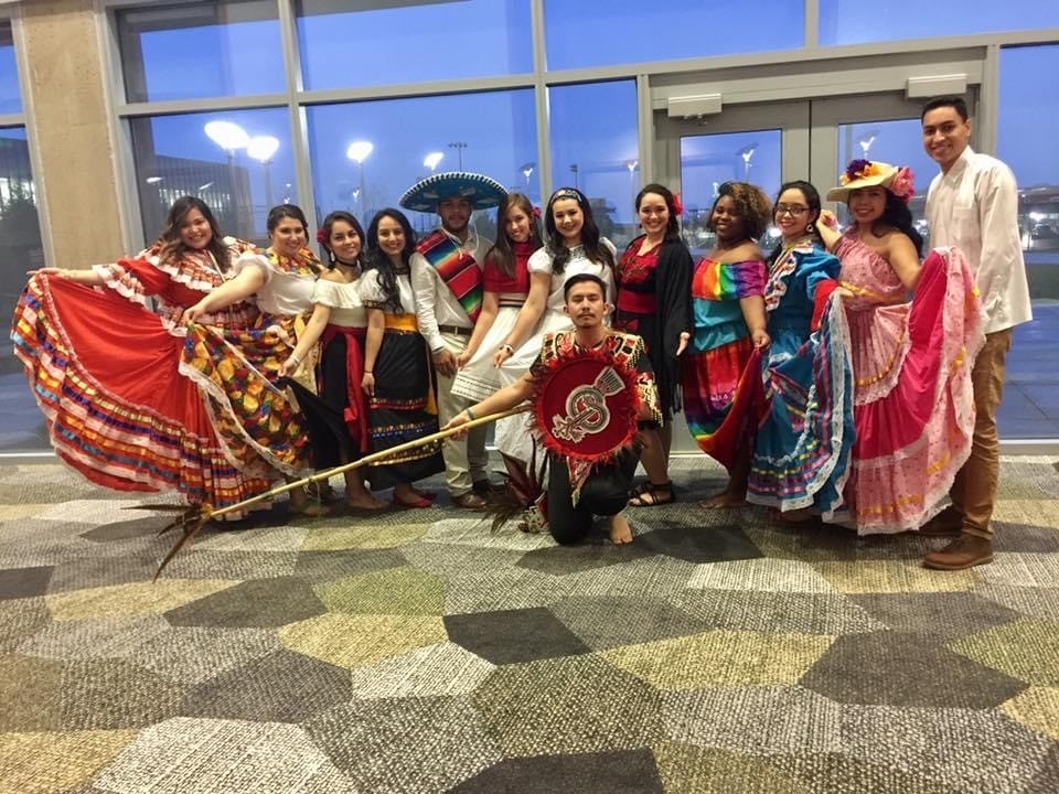Latino students in traditional clothing