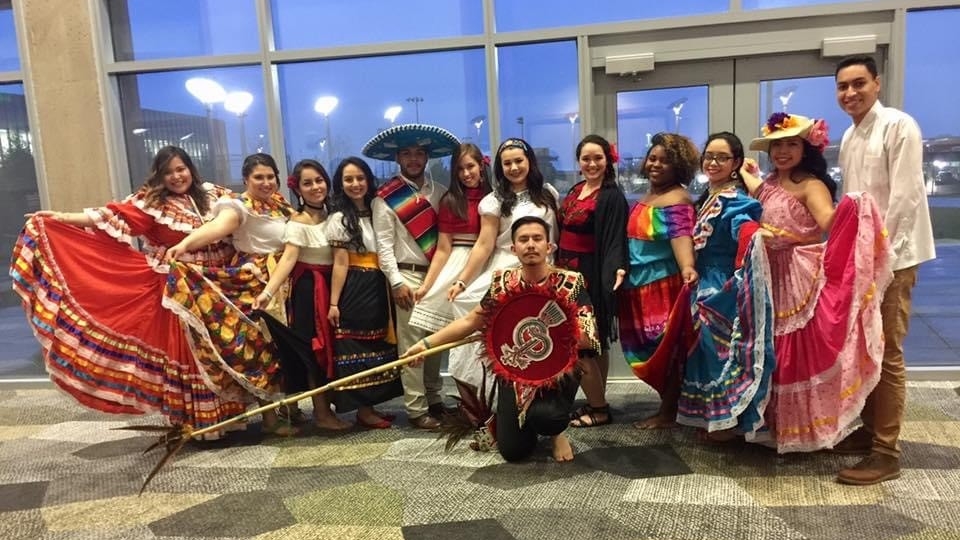 Latino students in traditional clothing