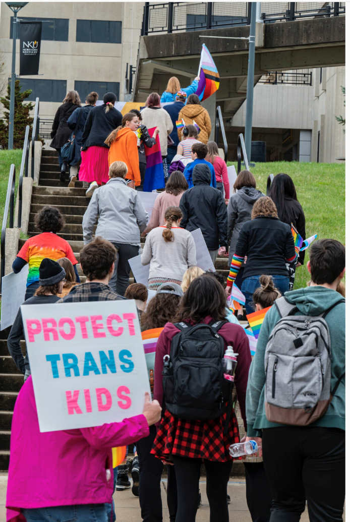 Pride Walk - sign reads Protect Trans Kids