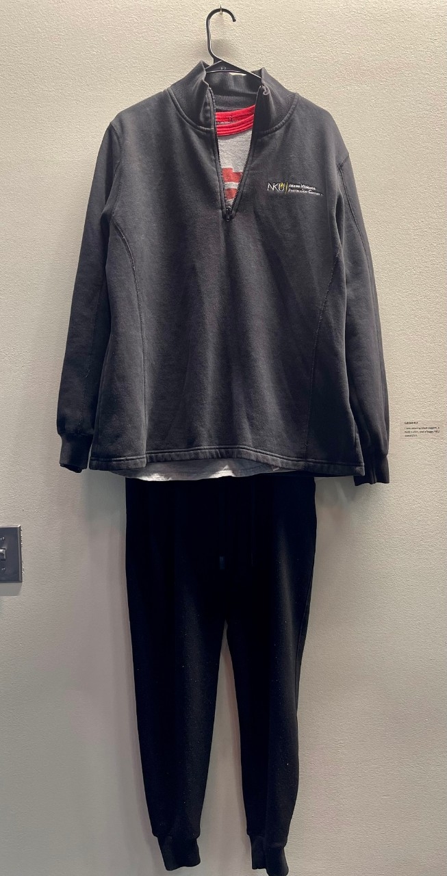 black joggers and oversized NKU sweatshirt over a tshirt