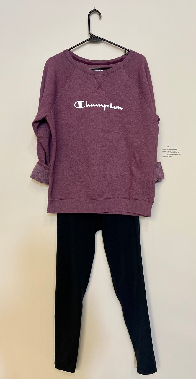 Purple champion sweatshirt and black sweatpants