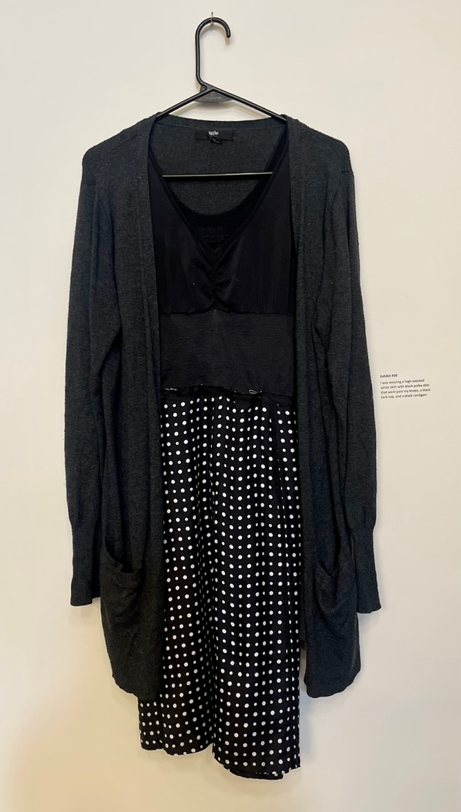 Black tank top, black and white polka dot, knee length skirt, grey cardigan
