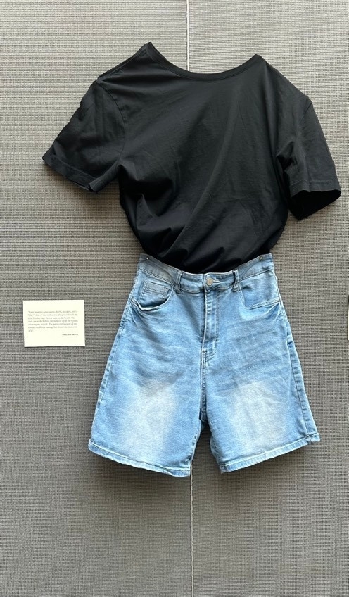 Black t-shirt with long denim shorts