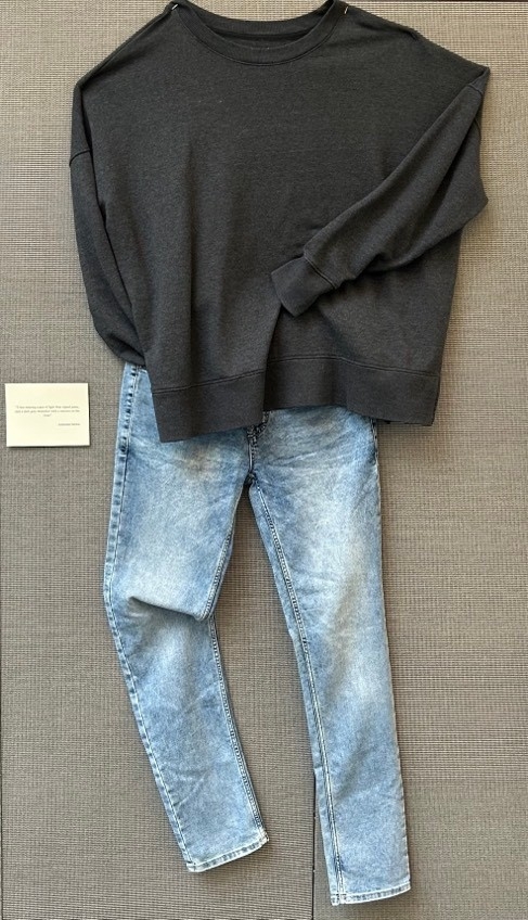 Dark gray sweatshirt with light jeans