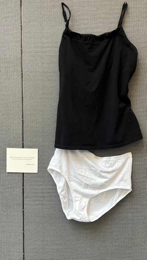 Black tank top with white cotton underwear