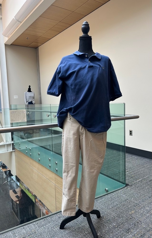 navy blue polo shirt and khaki pants